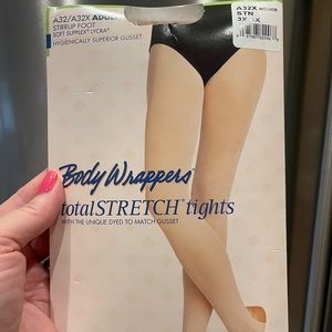New in package - 3X-4X Stirrup Foot Dance Tights (tan)